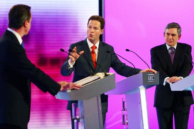 Liberal Democrat leader Nick Clegg (C) makes a point to Conservative Party leader David Cameron (L), as Prime Minister Gordon Brown looks on during the third and final leaders' debate, at the University of Birmingham, April 29, 2010. (Gareth Fuller - WPA Pool/Getty Images)