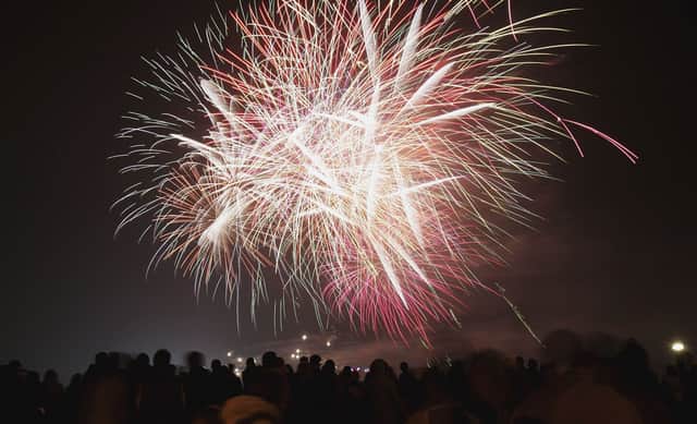 Over 30 firework displays across the UK have been cancelled this weekend after Storm Ciarán brought days of torrential rain. (Photo: Getty Images) 