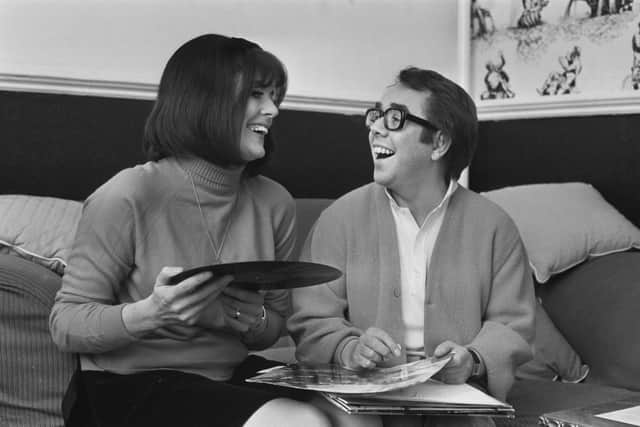 Scottish actor and comedian Ronnie Corbett (1930 - 2016) choosing records with his wife, actress Anne Hart, January 1969. (Photo by Ian Tyas/Keystone Features/Hulton Archive/Getty Images)