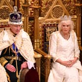 King Charles and Queen Camilla arrive for the start of the State Opening of Parliament in the House of Lords Chamber, the first King's Speech in 70 years. (Credit: Getty Images)