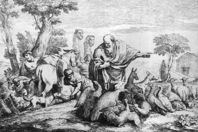 Noah and his sons collect two of every animal and herd them onto the ark in order to save them from the flood, circa 4000 BC. (Hulton Archive/Getty Images)