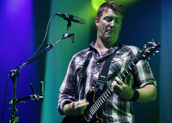Queens of The Stone Age are one of a number of acts confirmed in the first line-up announcement for Download Festival 2024 (Credit: Getty)