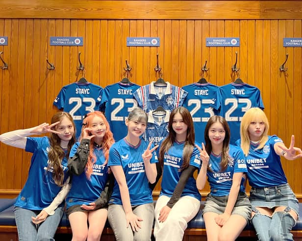 K-Pop group STAYC make the trip to Ibrox on Monday after accepting an invitation by Glasgow Rangers after they were spotted wearing the "wrong" sporting jersey during their Dallas, Texas show in October 2023 (Credit: STAYC on X)