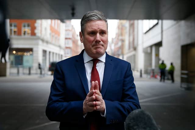 Sir Keir starmer remain under pressure from his party over calls to back a ceasefire in Gaza, with a front bench shadow minister stepping down in protest of his party's stance. (Credit: Getty Images)