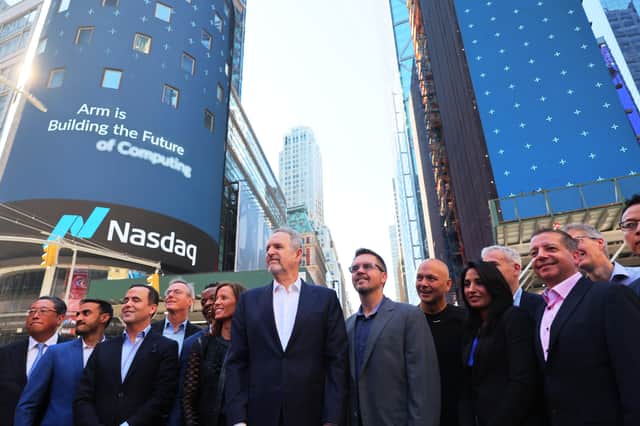 Arm Holdings CEO Rene Haas poses for a photo with members of leadership outside of the Nasdaq MarketSite on September 14, 2023 in New York City. Arm, the chip design firm that supplies core technology to companies that include Apple and NVidia, priced its initial public offering at $51 a share.  (Photo by Michael M. Santiago/Getty Images)