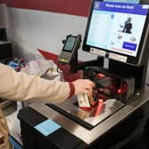 A customer uses a self checkout terminal (Photo: Christopher Furlong/Getty Images)
