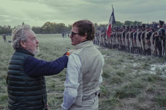 Ridley Scott and Joaquin Pheonix on set of Napoleon (Apple/ Columbia Pictures)