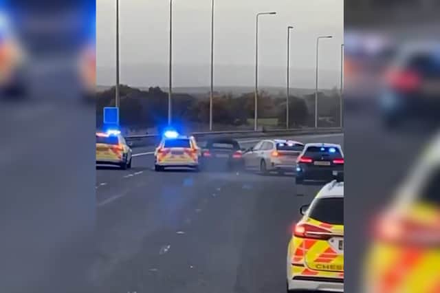 Dramatic footage shows police ramming a BMW in the middle of the M6, as marked and unmarked police cars surrounded the vehicle and collided with it.
The video was filmed by Chris Gibney, 32. The black BMW was stopped at around 3.30pm  near Stretton and fled police onto the M56 and then the M6.