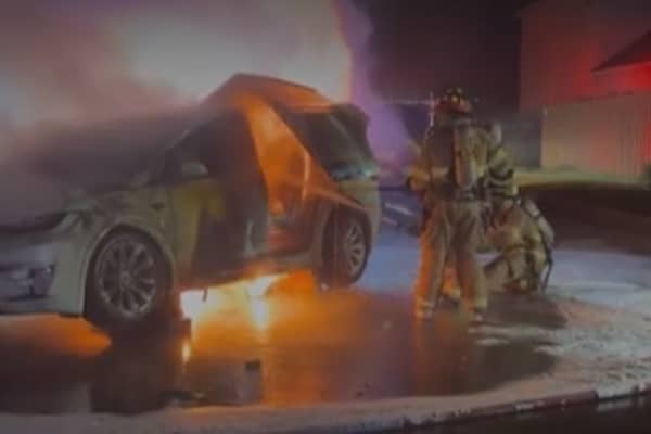 Firefighters tackle a Tesla fire in Plano, Texas (Photo: WFAA)