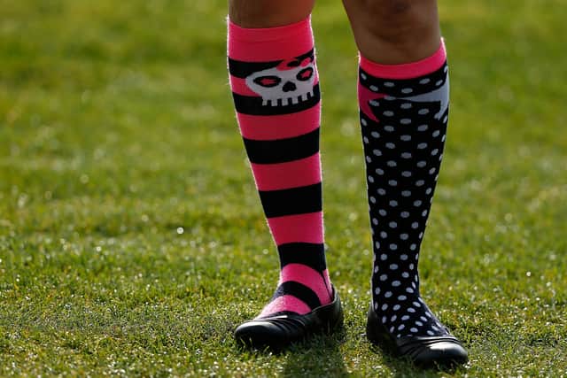 A golf fan during crazy sock day in the third round of the Shell Houston Open in 2013 (Photo: Scott Halleran/Getty Images)