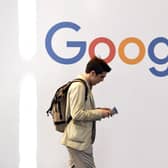 A man walks past the logo of Google in 2018 (Photo: ALAIN JOCARD/AFP via Getty Images)