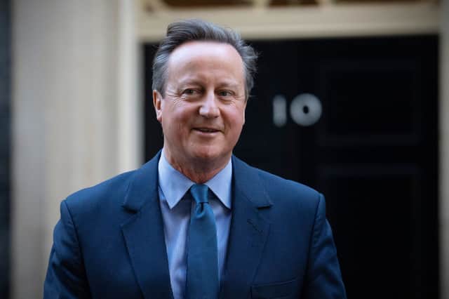 David Cameron back on Downing Street. Credit: Getty