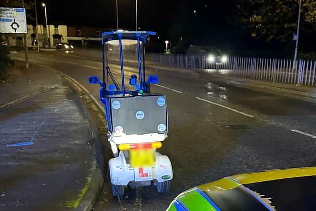 The scooter pulled over by the police on Lyons Lane South, Chorley, Lancashire 