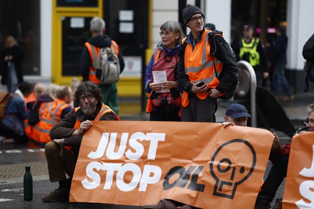 The Metropolitan Police have arrested 40 Just Stop Oil activists and warn this number "will rise" as a "large group" block a busy road in London. (Photo: Getty Images)