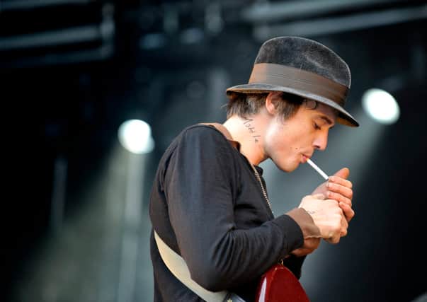 Pete Doherty - then of Babyshambles - smokes on stage in 2008 (Photo: JESSICA GOW/SCANPIX SWEDEN/AFP via Getty Images)