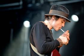 Pete Doherty - then of Babyshambles - smokes on stage in 2008 (Photo: JESSICA GOW/SCANPIX SWEDEN/AFP via Getty Images)