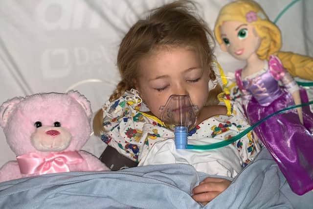 Reign Passey, now five, spent three weeks in hospital and had to undergo a lifesaving four-hour operation to remove the flesh-eating bacteria after catching chickenpox in 2022. 