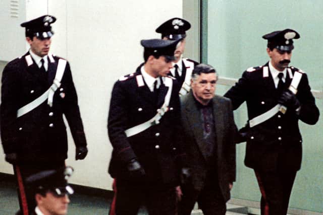 A picture taken on March 8, 1993 shows mafia boss Salvatore "Toto" Riina during his trial at the high security prison Ucciardone in Palermo. (Credit: Getty)