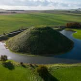 A moat has formed around the base of Silbury Hill in Wiltshire after heavy rainfall (Tom Wren / SWNS)