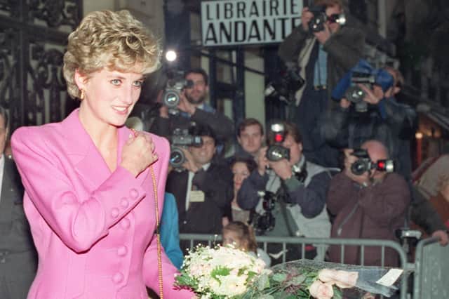 Princess Diana being photographed as she left an event in 1992. Her untimely death led to changes in press conduct after it was found the paparazzi chasing her in the car in Paris, France, contributed to the fatal crash. Picture: AFP via Getty Images