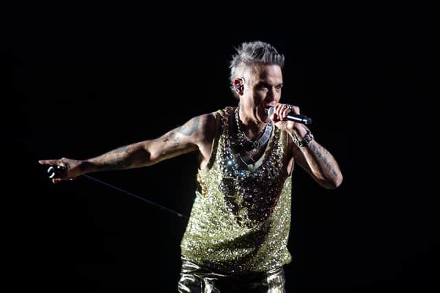 A woman is in a coma after suffering from a serious fall during a concert by Robbie Williams in Sydney, Australia. (Credit: Getty Images)
