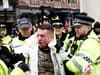 March against antisemitism: Tommy Robinson escorted away from London protest as man has been arrested