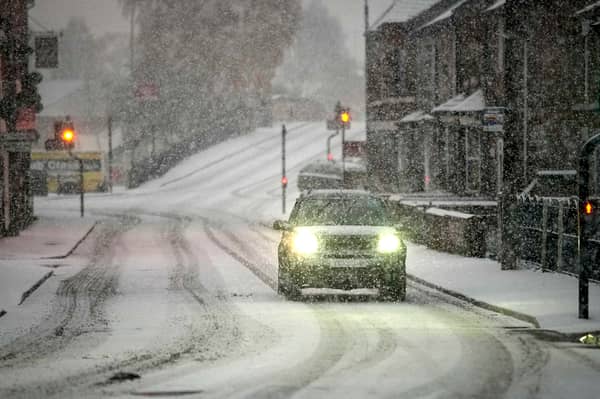 9 car hacks for cold weather you should know before a snow bomb hits. Picture: Christopher Furlong/Getty Images