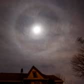 A halo or icebow appears around the moon above New York City (Photo: DON EMMERT/AFP via Getty Images)