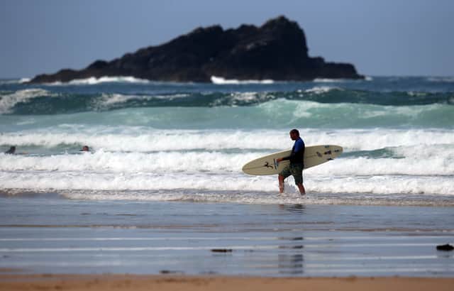 Reuben Santer, 33, had to stop working after he contracted Meniere's disease after surfing at Saunton Beach in Devon - with the cause "likely" sewage-polluted water. (Photo: Getty Images)