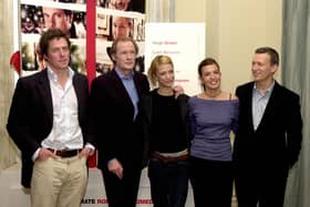 Hugh Grant, Bill Nighy, Heike Makotsch, Lucia Monic, and Duncan Kenworthy prior to giving a news conference ahead of the release of Love Actually in 2003 (Photo: HERWIG VERGULT/AFP via Getty Images)