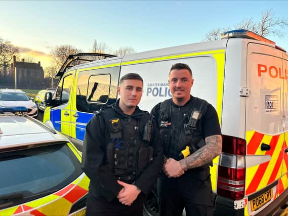 Greater Manchester Police Constables Aaron Kincaid and James Blundell saved a seven-year-old girl after she was choking on a sweet. (Credit: Greater Manchester Police)