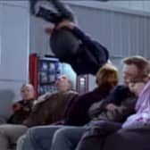 'Thomas Brodie-Sangster' performs a flip in an airport in the infamous Love Actually deleted scene (Photo: United International Pictures)