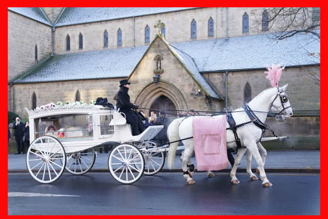 The horse drawn hearse carrying the casket of baby Indi Gregory, arrives at St Barnabus Cathedral, Nottingham, for her funeral service. Joe Giddens/PA Wire