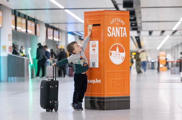 EasyJet has set up special orange post boxes at UK airports allowing children to drop Christmas letters to Santa. (Photo: Matt Alexander/PA Wire)