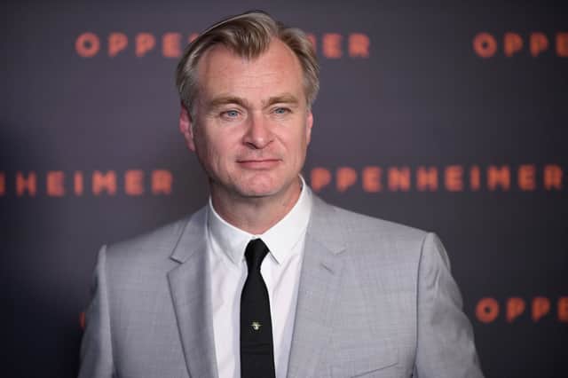US-British film director Christopher Nolan poses upon his arrival for the "Premiere" of the movie "Oppenheimer" at the Grand Rex cinema in Paris on July 11, 2023. (Photo by JULIEN DE ROSA / AFP)