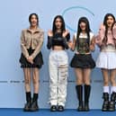 K-pop girl group NewJeans members, from left, Hyein, Haerin, Hanni, Danielle and Minji pose on the blue carpet at the 2024 Spring/Summer Seoul Fashion Week at Dongdaemun Design Plaza in September Picture: Jung Yeon-je / AFP