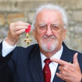  Bernard Cribbins poses with his Officer of the British Empire (OBE) medal after receiving it during an investiture ceremony with the Princess Anne, Princess Royal at Windsor Castle, on November 03, 2011 in Windsor, England. (Photo by Chris Ison - WPA Pool/Getty Images)