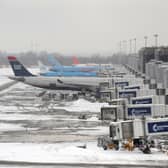 East Midlands Airport has announced its runway is "temporarily closed" this morning as its teams "work hard to clear it" after snow flurries. (Photo: AFP via Getty Images)