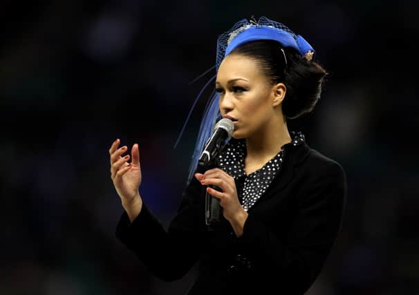 X Factor runner up, Rebecca Ferguson performs prior to the AVIVA Premiership match between Harelquins and London Irish at Twickenham Stadium on December 27, 2010 in London, England.  (Photo by Warren Little/Getty Images)