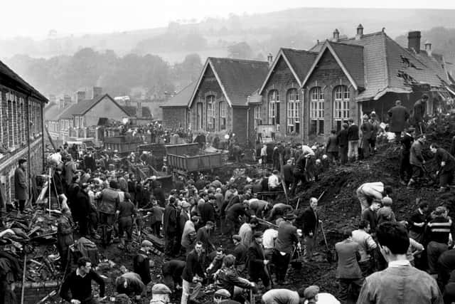 Rescue workers continue their search for victims of the Aberfan disaster, in South Wales (Jim Gray/Getty Images)