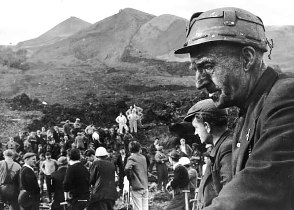 Rescue workers at the scene of the wrecked Pantglas Junior School at Aberfan, South Wales, where a coal tip collapsed killing over 190 children and their teachers.   (Keystone/Getty Images)