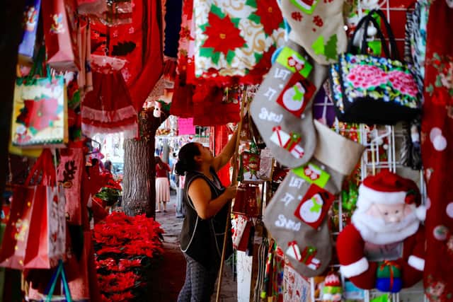Christmas decorations are displayed for sale at a market in Mexico City
