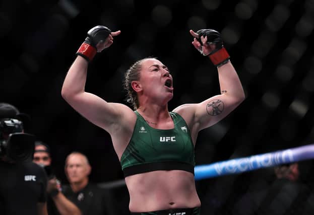 Molly McCann of England celebrates defeating Hannah Goldy of USA in the Flyweight bout during UFC Fight Night at O2 Arena on July 23, 2022 in London, England. (Photo by Julian Finney/Getty Images)