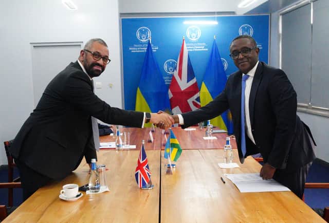 James Cleverly signs the new treaty with Rwanda. Credit: Getty