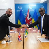 James Cleverly signs the new treaty with Rwanda. Credit: Getty