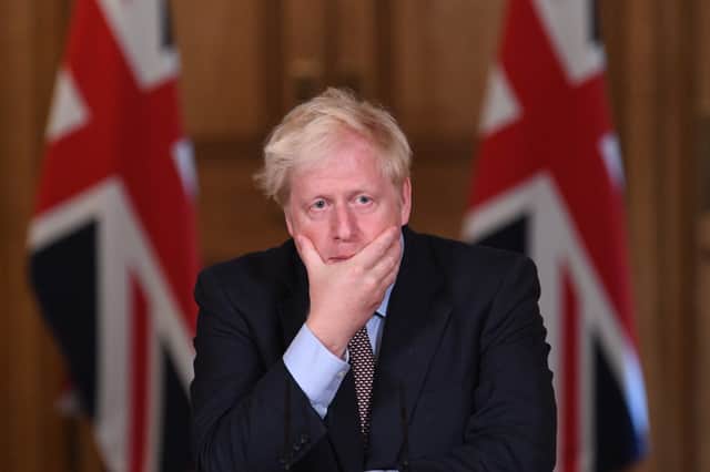 Boris Johnson still hasn't handed over WhatsApp messages from the first lockdown to the Covid Inquiry ahead of his appearance today - but he insisted he did not delete them. (Credit: Getty Images)
