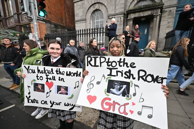 Fans of Shane MacGowan paid tribute to the late singer as his cortege passed through Dublin's southside. (Credit: Getty Images)