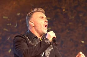 Gary Barlow is set to host a new ITV travel series being filmed shortly before Take That go on tour . (Photo by National Lottery)