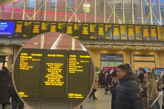 Departure boards announce mass train cancellations and delays at King's Cross