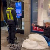 Homeless man Aaron McCarthy protests in London after a McDonald's security worker soaks his sleeping back with bleach water Picture: Damon Evans